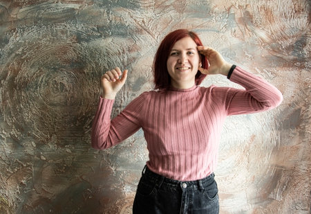 Portrait of a girl from the waist up. Gentle, carefree, friendly, modern, gorgeous girlの写真素材