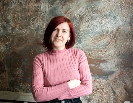 Portrait of a girl from the waist up. Gentle, carefree, friendly, modern, gorgeous girl
