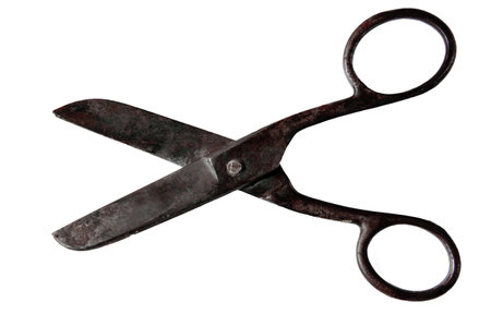 Vintage open scissors close up isolated on white backgroundの写真素材