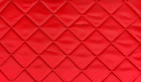 Red fabric background. Fabric with diamond threads