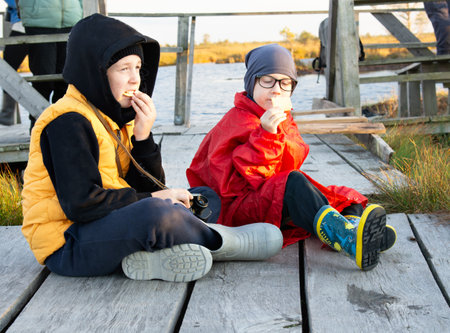 Family holidays in nature after a long walkの写真素材