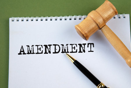 AMENDMENT - word on a white sheet with a judge's gavel
