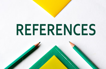 REFERENCES - word close-up on white sheet with folders and pencils. Info conceptの写真素材