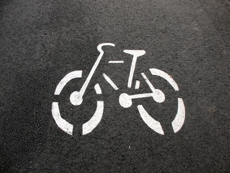 Designation of a bicycle path on the pavementの写真素材