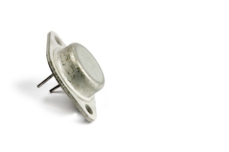 Radio element, a very old diode close-up, on a white backgroundの写真素材