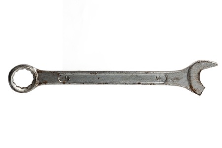 Broken open-end wrench on a white background close-up.の写真素材