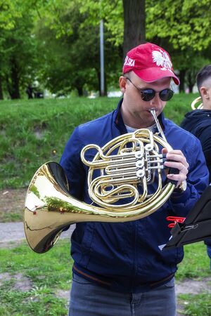 Kaliningrad Russia 05.012019 Street musician plays the melody on the trumpet