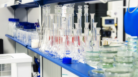 Laboratory glassware on the shelf in the laboratoryの写真素材