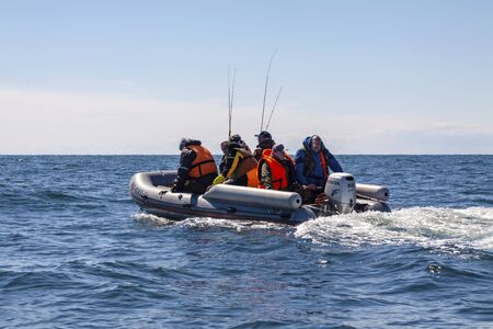 Baltiysk Russia 04.05.2019 Fishermen go fishing in a boat
