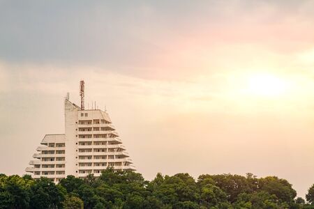 Anapa, Russia 30.07.2019 High-rise hotel against the backdrop of the setting sunのeditorial素材
