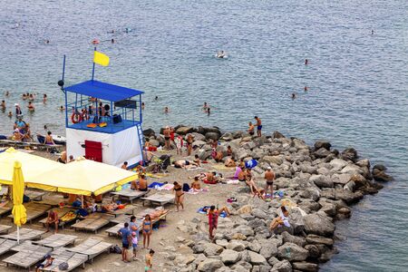 Russia, Anapa, 30.07.2019 City beach with many holidaymakers.のeditorial素材