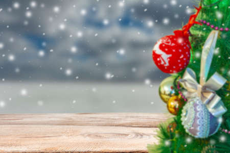 Blurred background. New Year's theme, Christmas toys weigh on the Christmas treeの写真素材