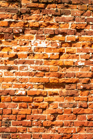 Background. Ancient masonry of a brick wall.の写真素材