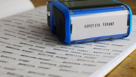 Repetita iuvant. A Latin phrase That means repeating does good.の写真素材