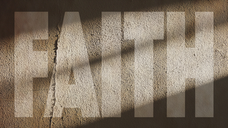 Faith Written on a Repaired Cracked Wallの写真素材