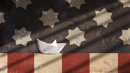 Paper Boat Sailing with US Flagの写真素材