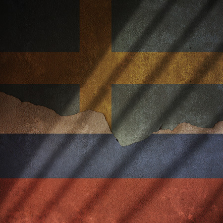 Flags of Sweden and Russia on a concrete Cracked Wallの写真素材