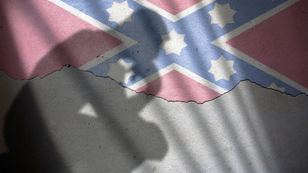 Confederate Memorial Day. Flag on Cracked Plaster Wallの写真素材