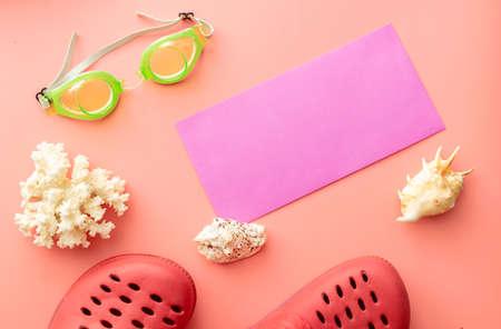 summer background of yellow sunglasses on pink backgroundの写真素材