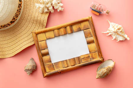 summer background: starfish, sunglasses on blue wooden background