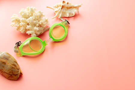 summer background: starfish, sunglasses on blue wooden background
