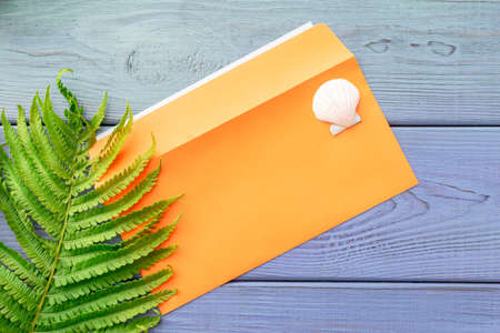 summer background: starfish, sunglasses on blue wooden backgroundの写真素材