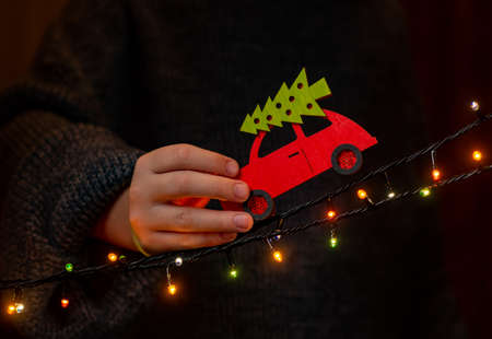 Christmas cars in the hands of a boyの写真素材