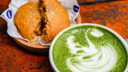 Green tea matcha latte and cookiesの写真素材