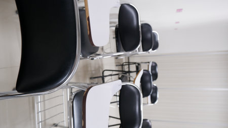 Empty Classroom with desks and chairs in a school or university.の写真素材