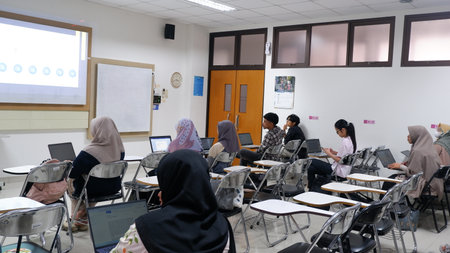 Yogyakarta, Indonesia - October 21st, 2023. Group of students attending class in the classroom....