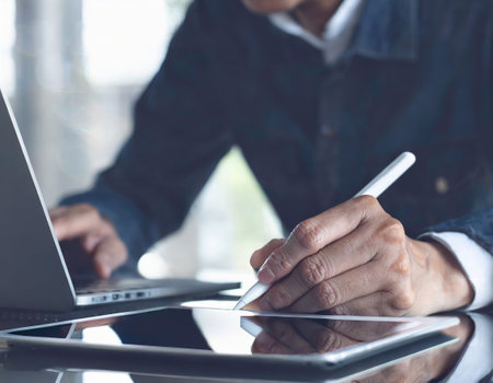 businessman hand working with new modern computer and business strategy as conceptの写真素材