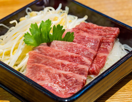 Japanese wagyu beef sashimi on rice vermicelliの写真素材