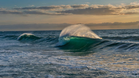Ocean wave at sunset in Bonaire island, Caribbean sea.