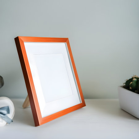 Photo frame mockup with cactus on white table, stock photo