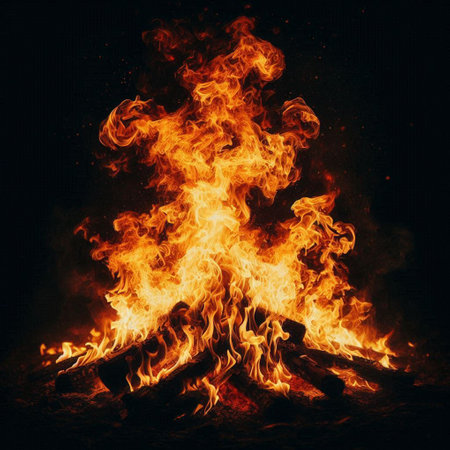 Flames of a campfire on a black background. Fire background