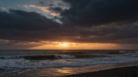 Sunset over the sea with clouds in the sky, long exposureの写真素材