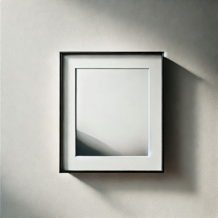 Blank picture frame hanging on the white wall. 3d renderingの写真素材