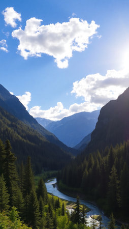 Mountain landscape with river and blue sky with clouds in summer.