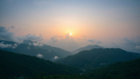 Sunset over the mountains. Beautiful landscape of mountains and sky.