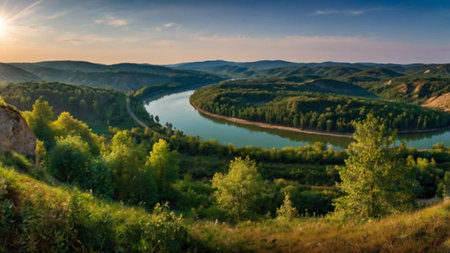 Panoramic view of the valley and the river at sunset.