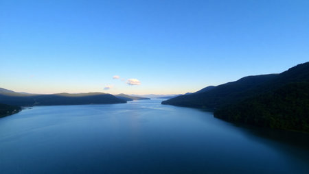 panoramic view of fjord in norway at sunsetの写真素材