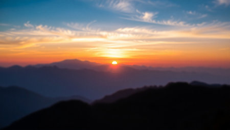 Sunset over the mountain range, Blurred backgroundの写真素材