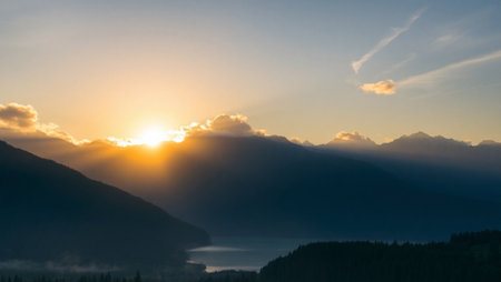 Sunset in the mountains. Panoramic view of the lake and mountains.の写真素材