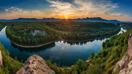 Panoramic view of river and mountains at sunset. Beautiful summer landscapeの写真素材