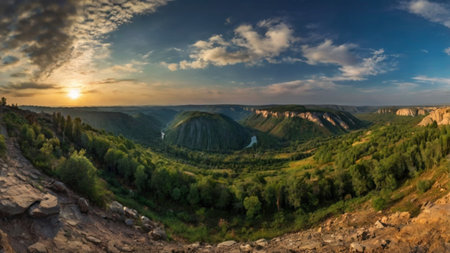 Panoramic view of the river valley and mountains at sunset.