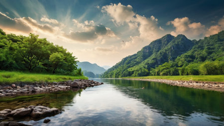 Landscape of river and mountains at sunset. Panoramic view
