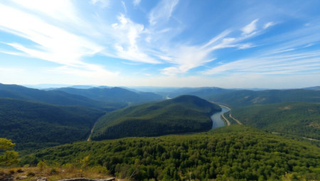 Panoramic view of the mountains and the river in the valleyの写真素材