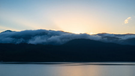 Landscape view of the lake and mountains in the morning at sunrise