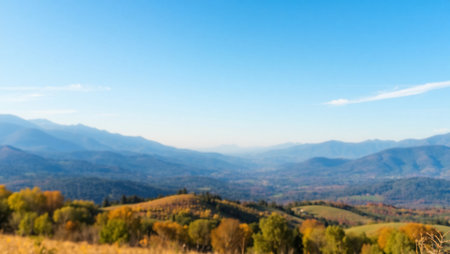 mountain autumn landscape. trees in foliage against the blue sky.