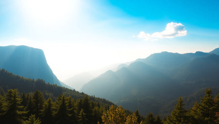Mountain landscape with fog and sun rays. Panoramic view.の写真素材